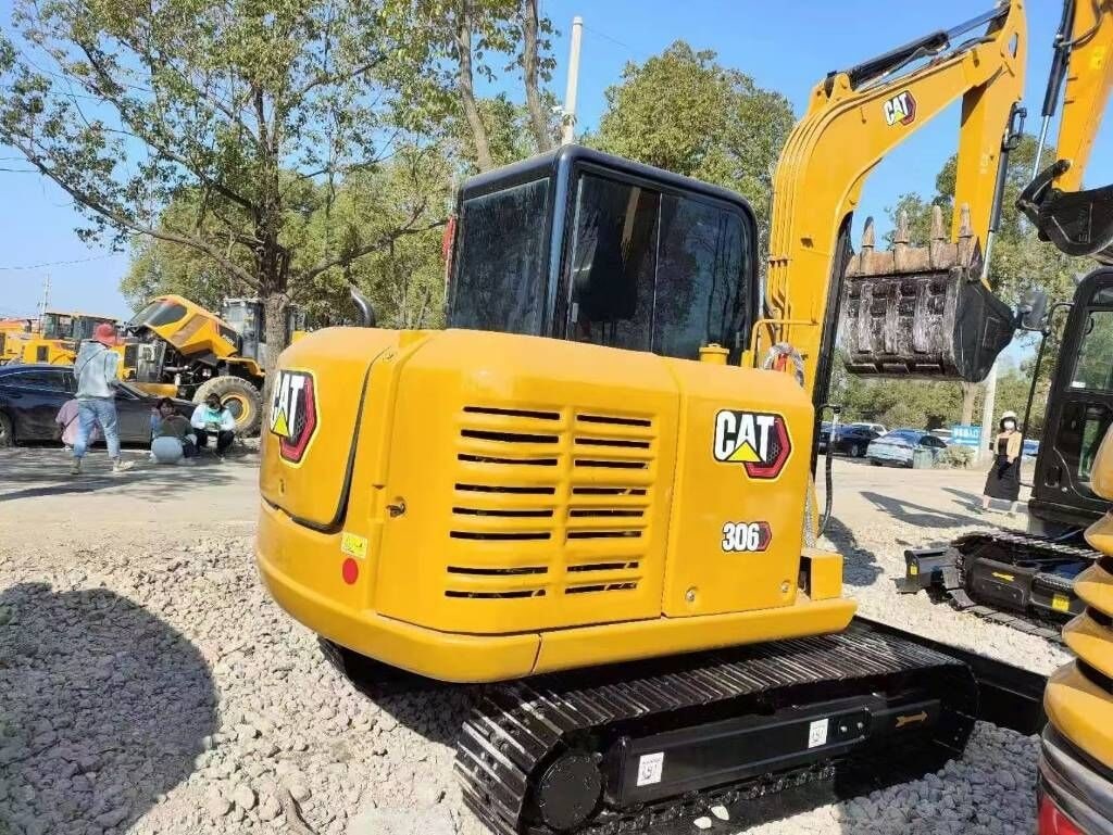 2025 Caterpillar 306 mini excavator rear three-quarter view 2025 Caterpillar 306 mini excavator rear three-quarter view