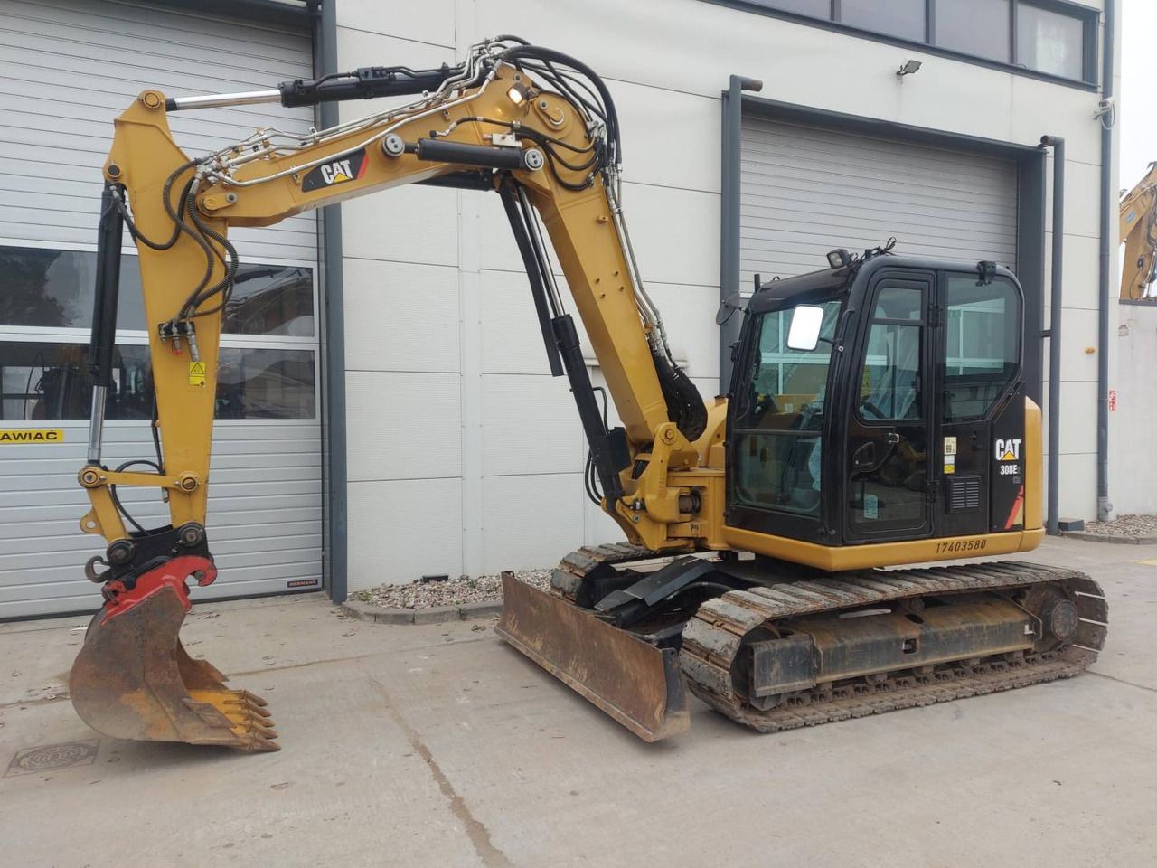 2017 Caterpillar 308E2CR crawler excavator side view 2017 Caterpillar 308E2CR crawler excavator side view