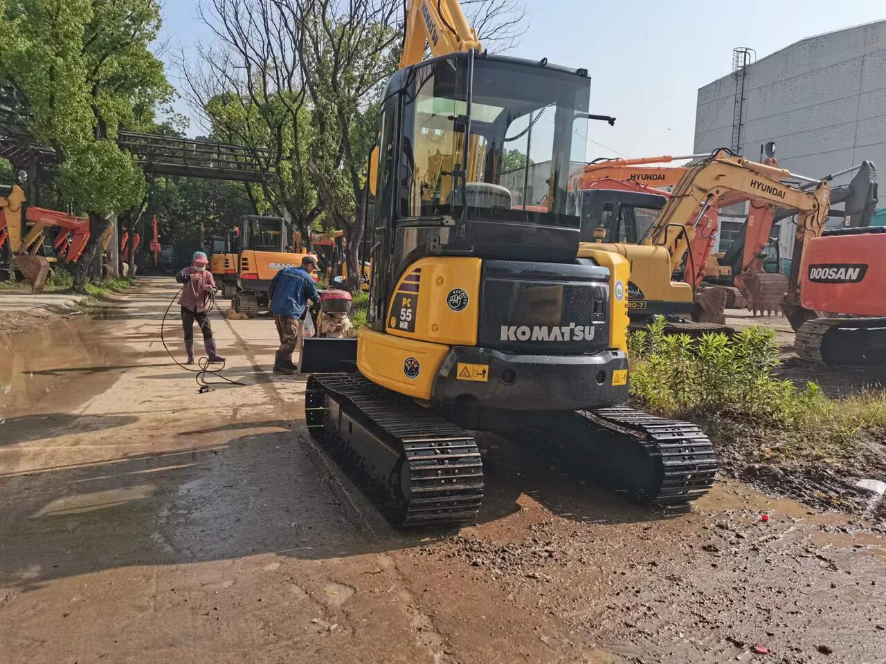 2022 Komatsu PC-55MR mini excavator, rear three-quarter view 2022 Komatsu PC-55MR mini excavator, rear three-quarter view