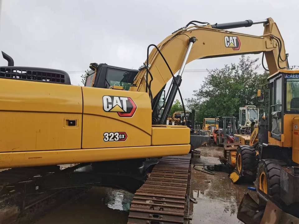 2021 Caterpillar 323GX crawler excavator, side profile view
