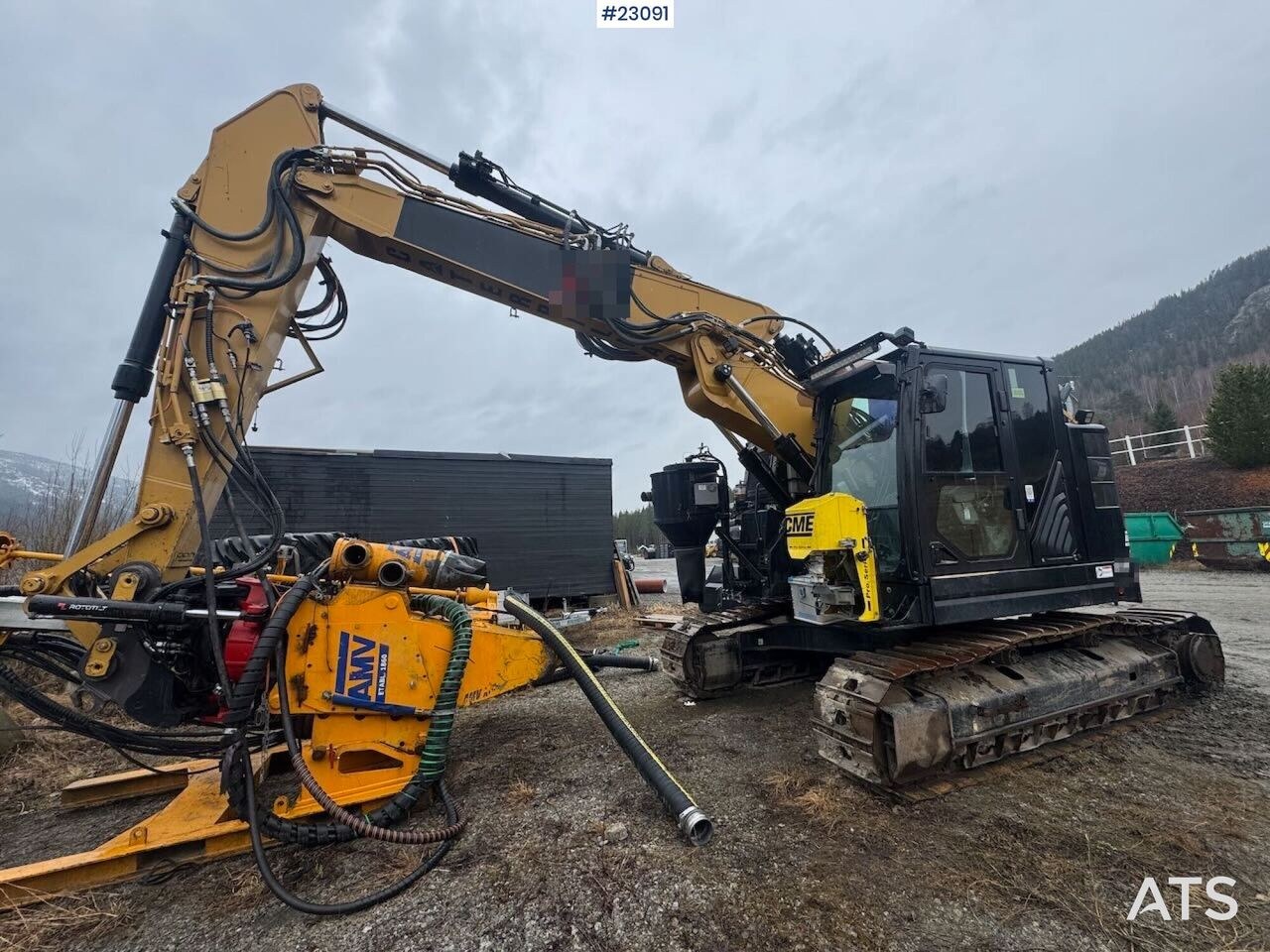 2017 Caterpillar 325FL crawler excavator with drilling attachment, side view 2017 Caterpillar 325FL crawler excavator with drilling attachment, side view