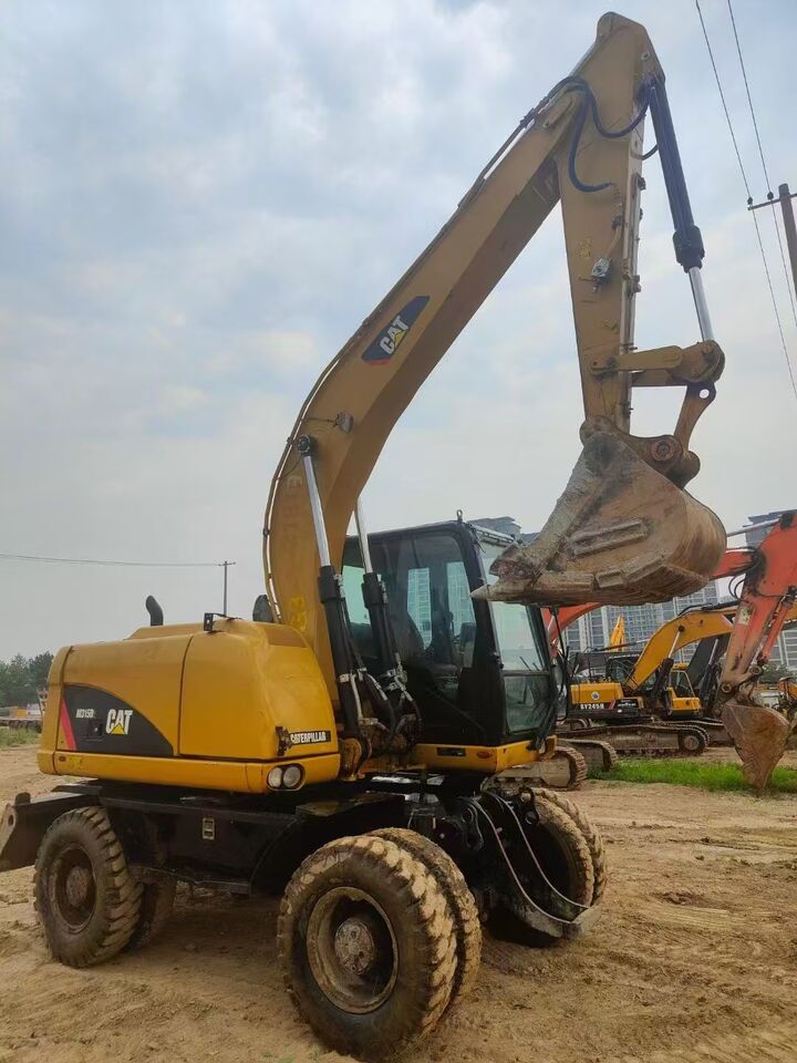 2023 Caterpillar M315D wheel excavator, side profile view 2023 Caterpillar M315D wheel excavator, side profile view