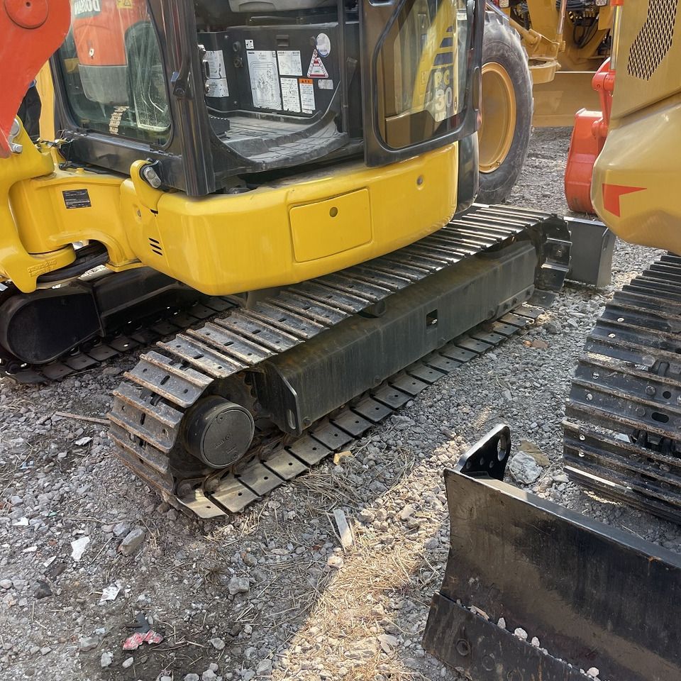 Komatsu PC30MR mini excavator side view of tracks and cab