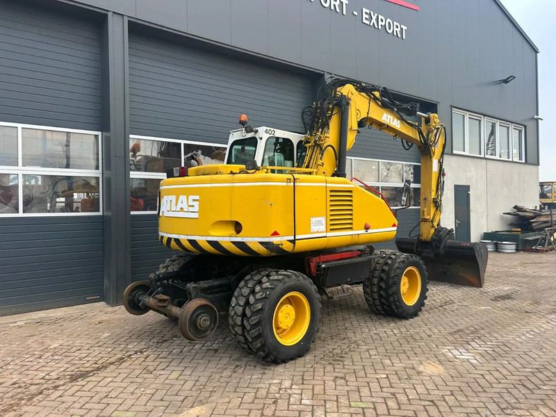 2000 Atlas 1404K wheel excavator, rear three-quarter view
