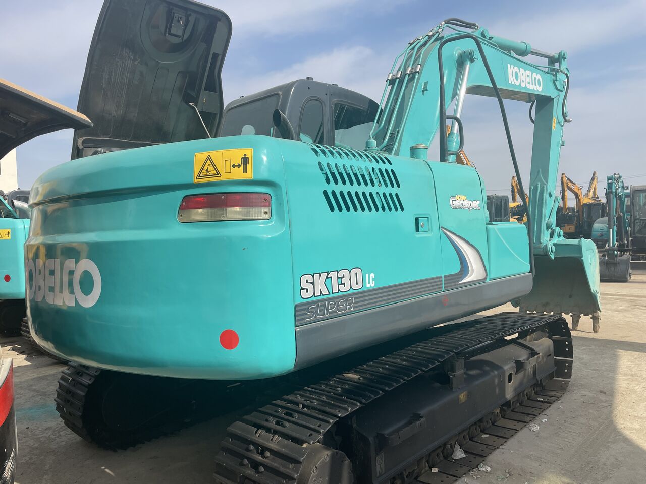 2023 Kobelco SK130 LC Super crawler excavator, rear three-quarter view 2023 Kobelco SK130 LC Super crawler excavator, rear three-quarter view