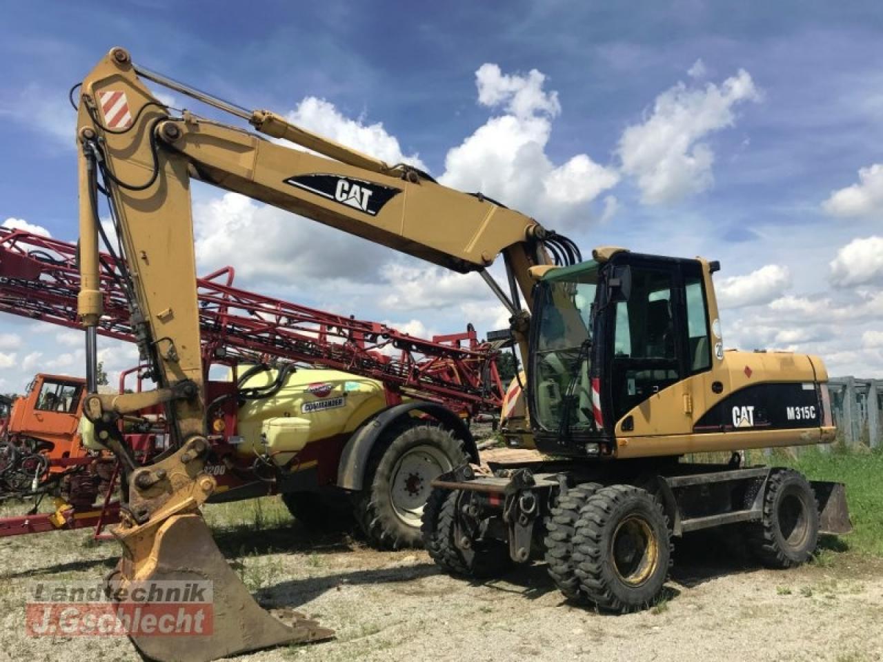2003 Caterpillar M315C wheel excavator, side view 2003 Caterpillar M315C wheel excavator, side view