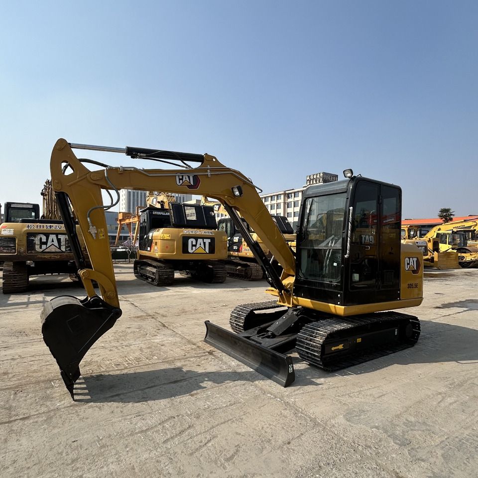 2023 Caterpillar 305.5E mini excavator, side profile view