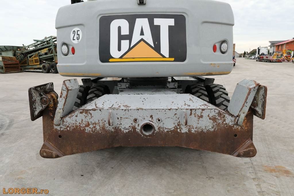 2009 Caterpillar M313D wheel excavator rear view 2009 Caterpillar M313D wheel excavator rear view