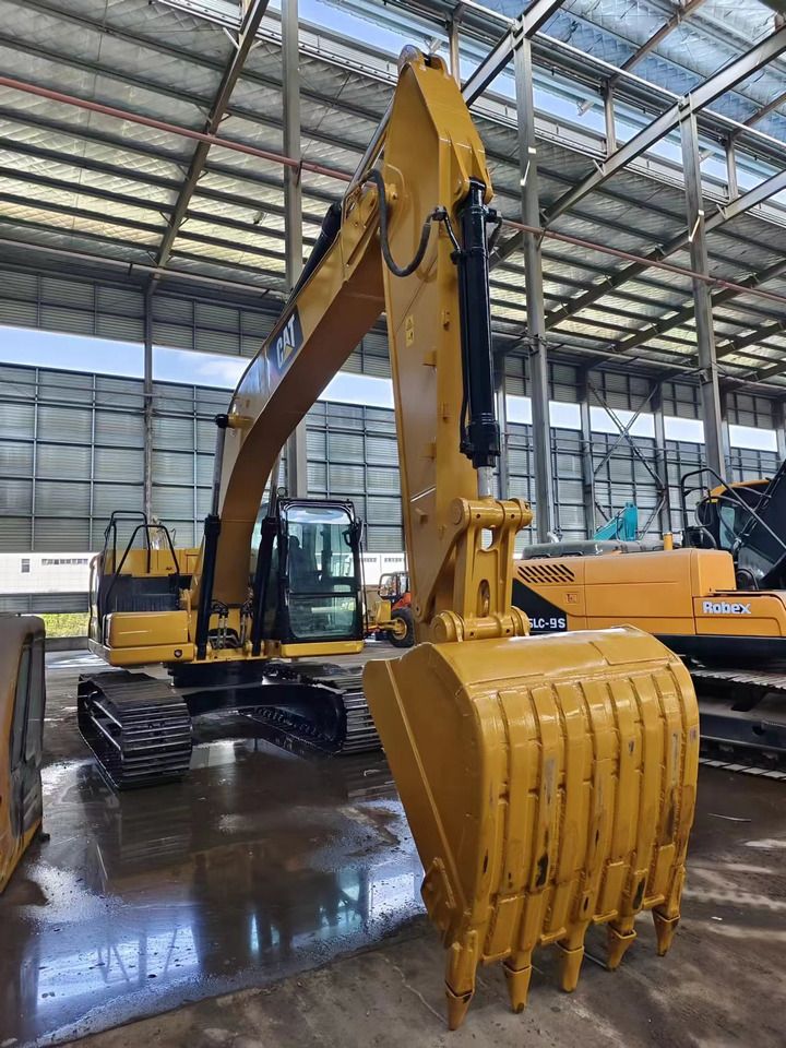 2023 Caterpillar 320GC crawler excavator, front three-quarter view 2023 Caterpillar 320GC crawler excavator, front three-quarter view