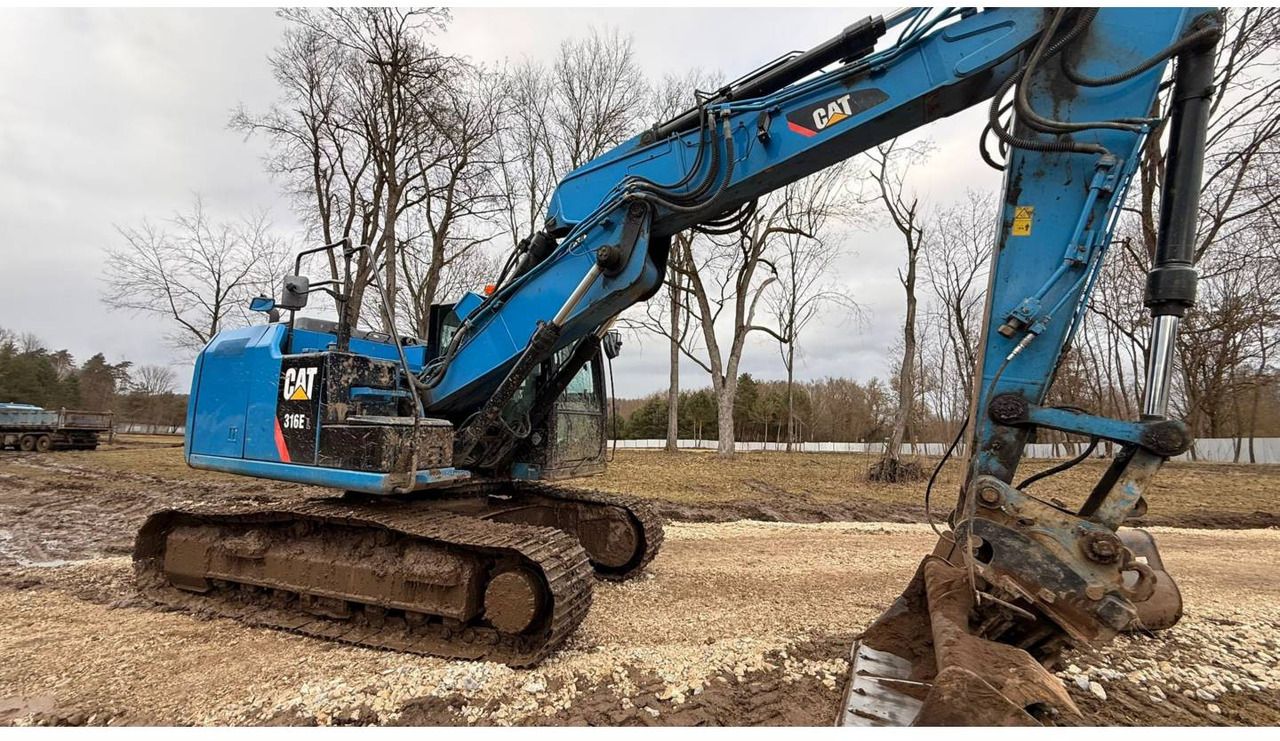 2013 Caterpillar 316EL crawler excavator, side view