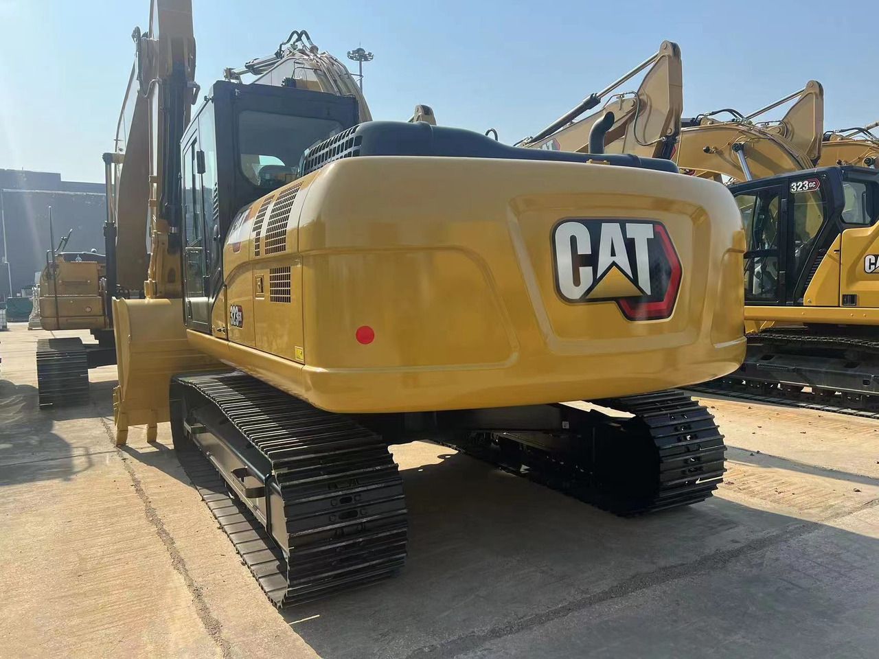 2026 Caterpillar 323GX crawler excavator, rear three-quarter view 2026 Caterpillar 323GX crawler excavator, rear three-quarter view