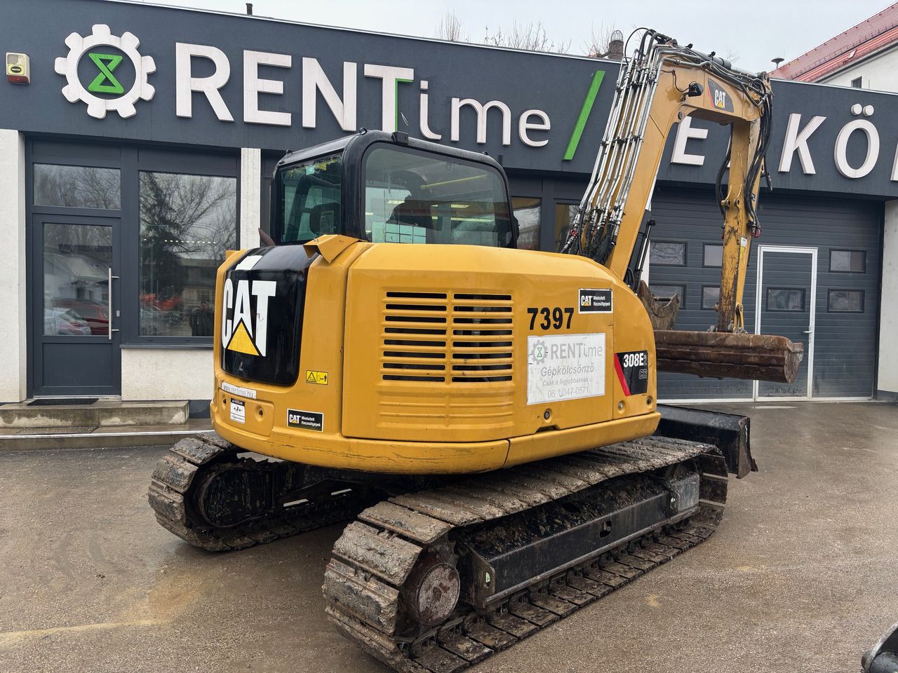 2016 Caterpillar 308E2CR crawler excavator, rear three-quarter view 2016 Caterpillar 308E2CR crawler excavator, rear three-quarter view