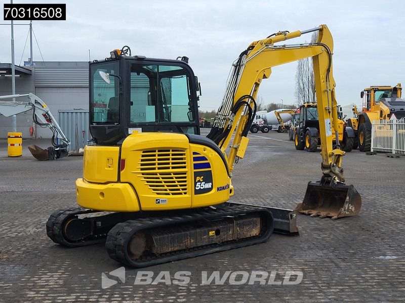 2024 Komatsu PC55MR-5 mini excavator, rear three-quarter view