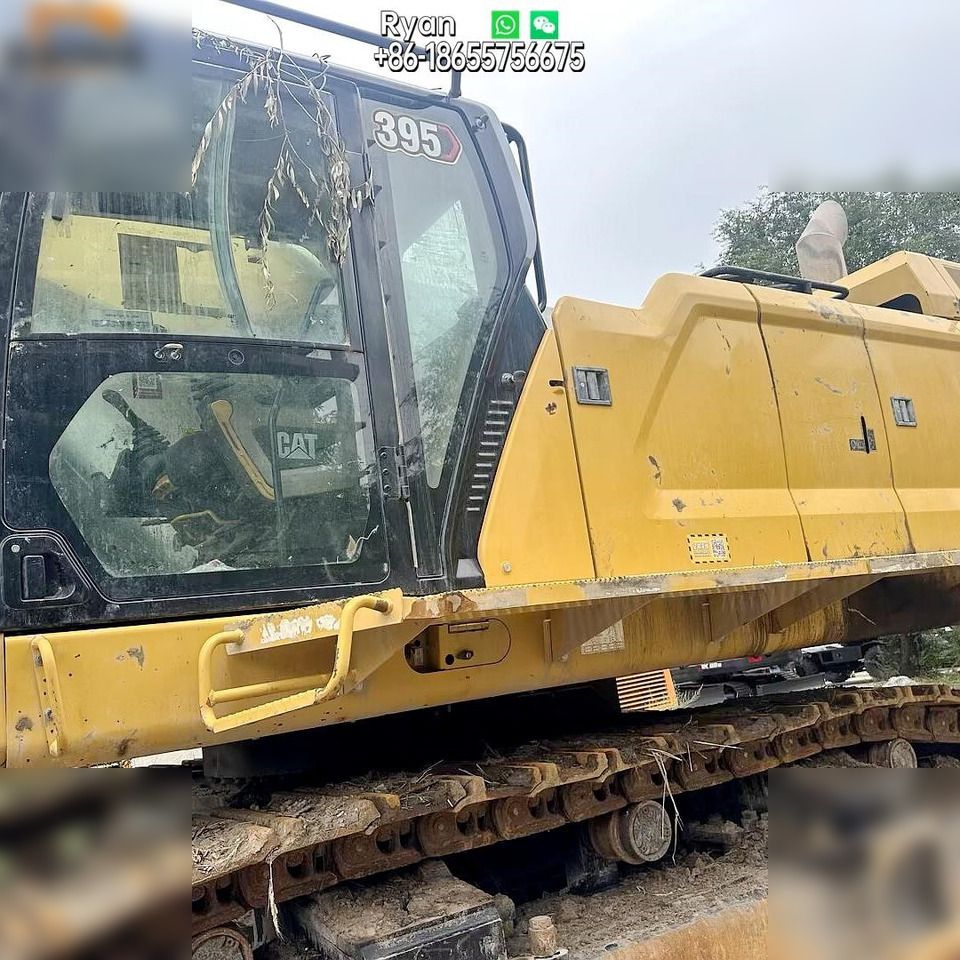 2021 Caterpillar 395 crawler excavator side view of cab