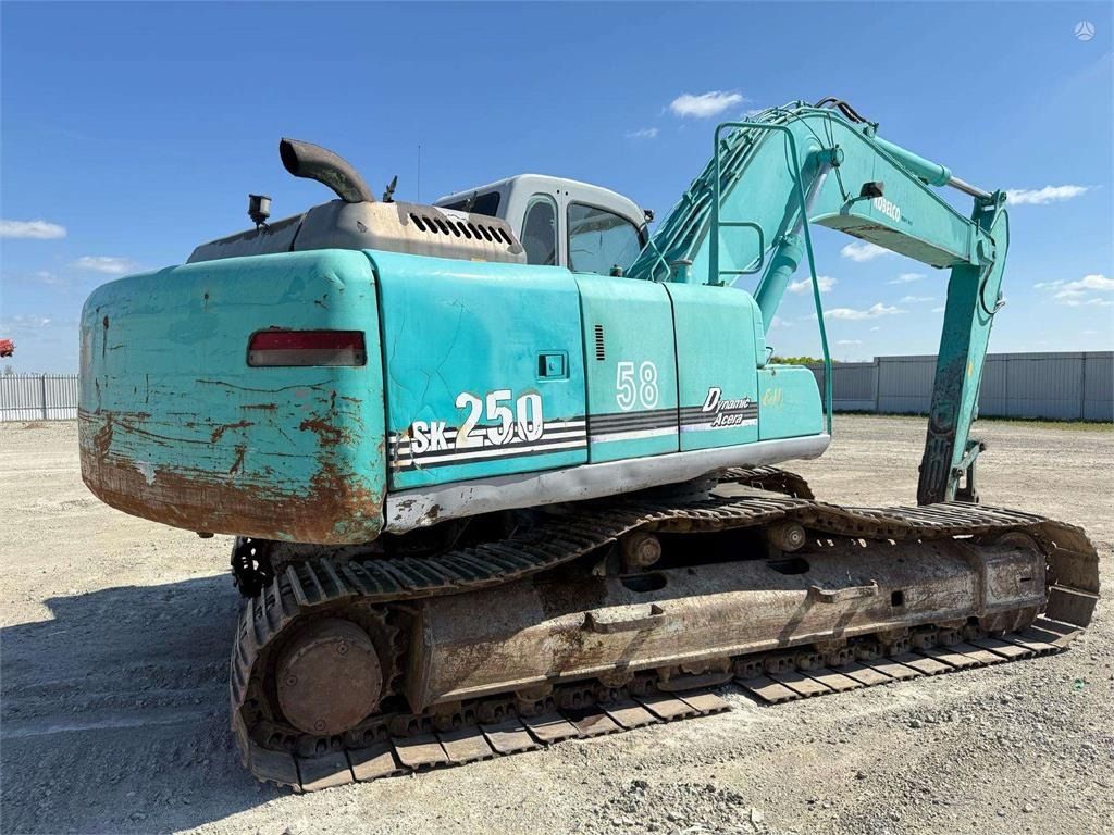 2001 Kobelco SK 250 crawler excavator rear three-quarter view 2001 Kobelco SK 250 crawler excavator rear three-quarter view