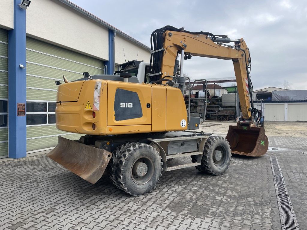 2015 Liebherr A918 wheel excavator, rear three-quarter view 2015 Liebherr A918 wheel excavator, rear three-quarter view