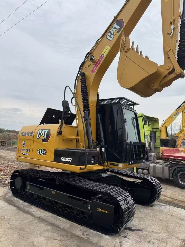 2022 Caterpillar 312GC mini excavator, side view 2022 Caterpillar 312GC mini excavator, side view