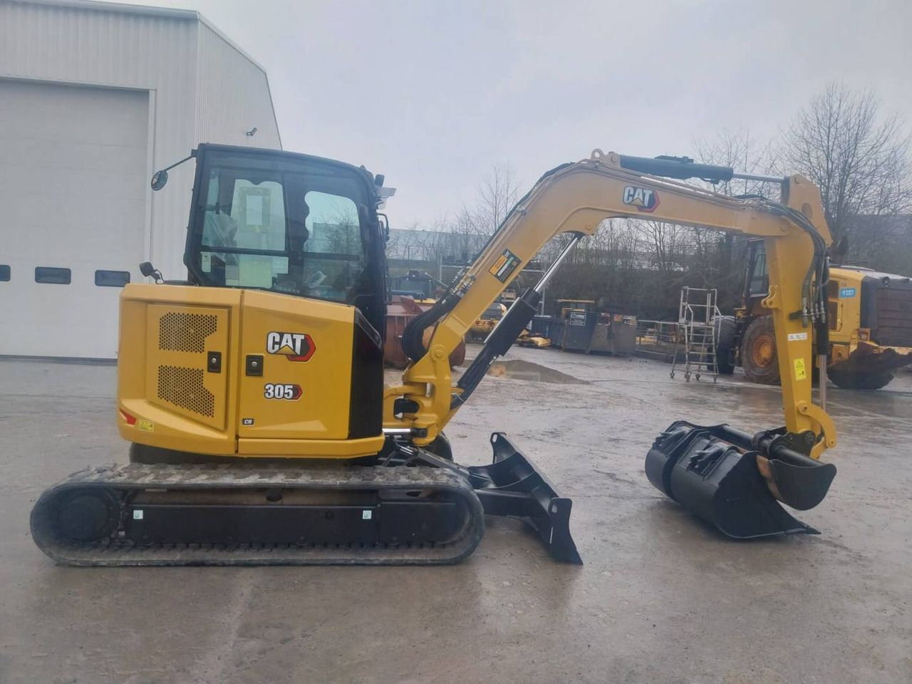 2023 Caterpillar 305 crawler excavator, side view