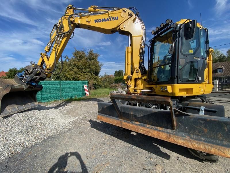 2020 Komatsu PW118MR-11 wheel excavator, front three-quarter view 2020 Komatsu PW118MR-11 wheel excavator, front three-quarter view