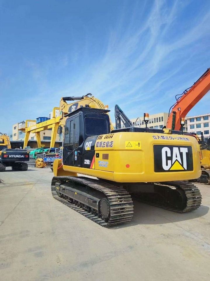 2023 Caterpillar 320D2 minigraafmachine, achteraanzicht driekwart 2023 Caterpillar 320D2 minigraafmachine, achteraanzicht driekwart