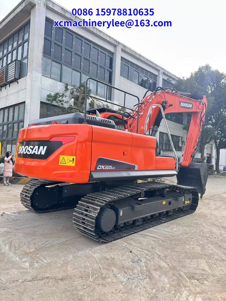 2022 Doosan DX225LCA crawler excavator, rear three-quarter view