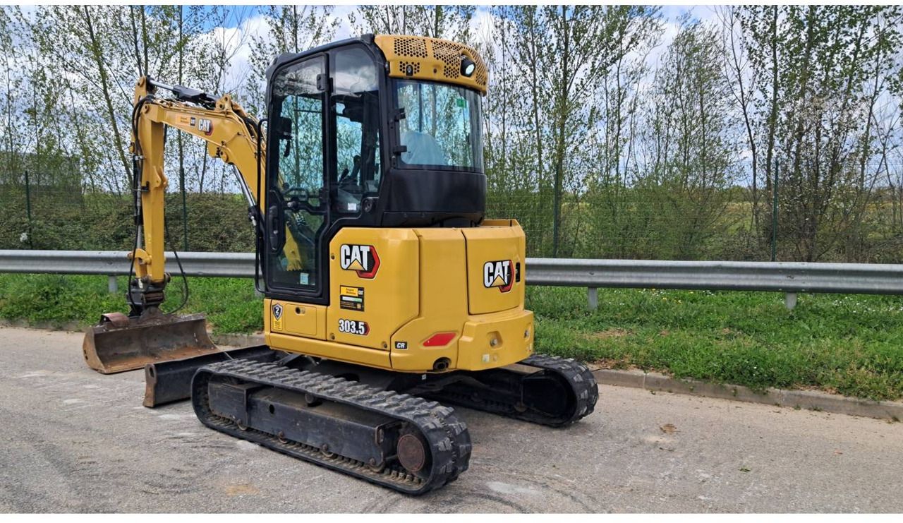 2022 Caterpillar 303.5 crawler excavator, rear three-quarter view 2022 Caterpillar 303.5 crawler excavator, rear three-quarter view