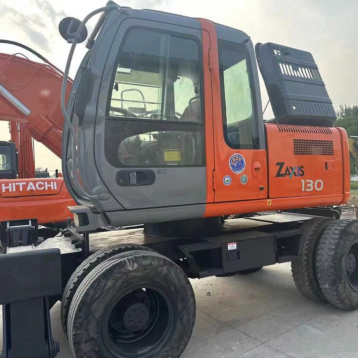 2023 Hitachi Zaxis 130 wheel excavator side view