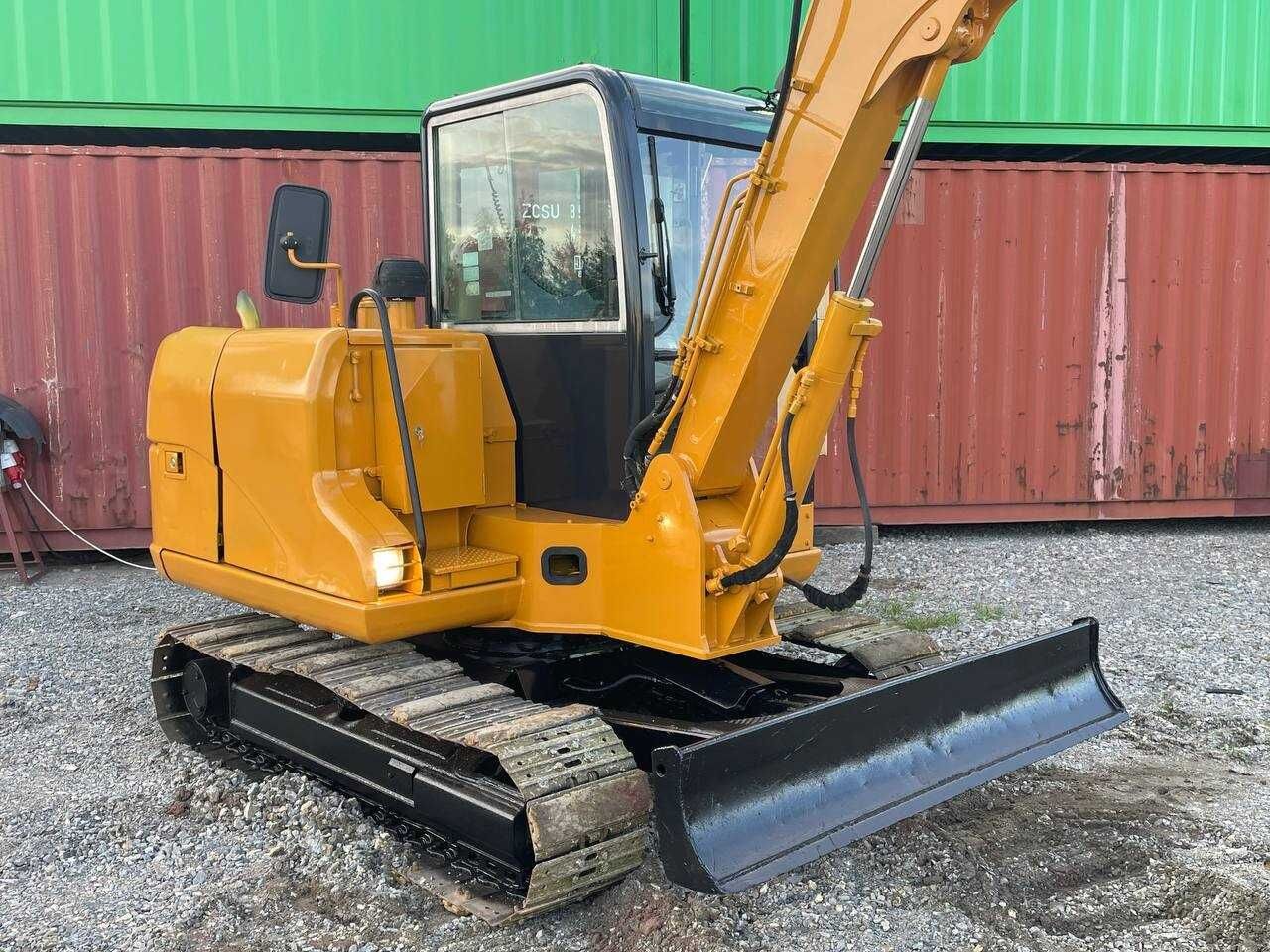 2010 Caterpillar 306 crawler excavator, front three-quarter view 2010 Caterpillar 306 crawler excavator, front three-quarter view