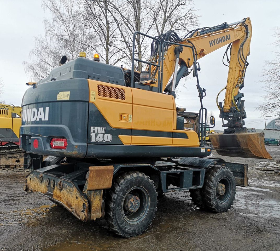 2016 Hyundai HW140 wheel excavator rear three-quarter view