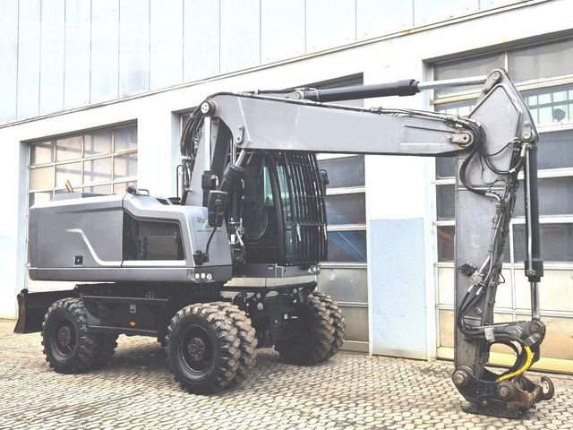 2020 Caterpillar M320F wheel excavator, side view 2020 Caterpillar M320F wheel excavator, side view