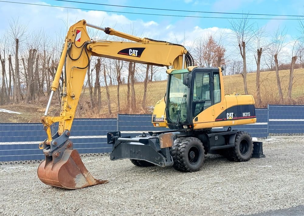 2003 Caterpillar M315C wheel excavator, front three-quarter view