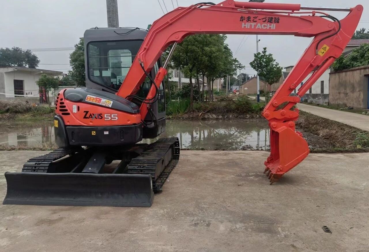 Hitachi Zaxis 55 mini excavator, rear three-quarter view Hitachi Zaxis 55 mini excavator, rear three-quarter view