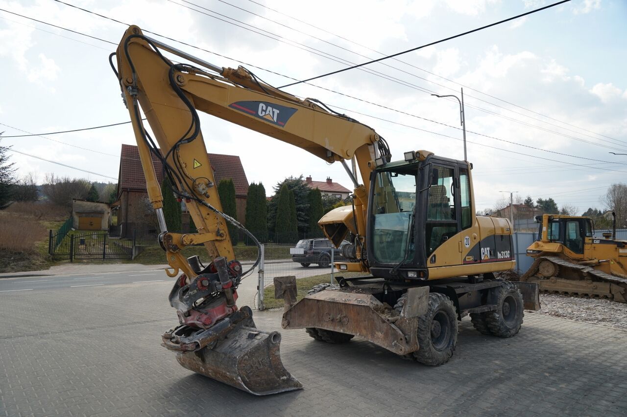 Pelle sur roues Caterpillar M313C de 2003 Pelle sur roues Caterpillar M313C de 2003