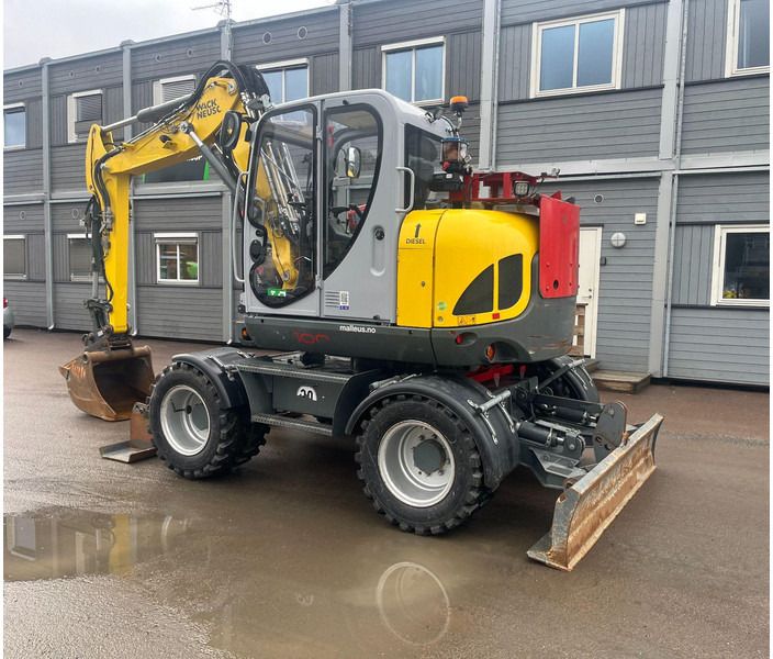 2022 Wacker Neuson EW100 wheel excavator, side view 2022 Wacker Neuson EW100 wheel excavator, side view