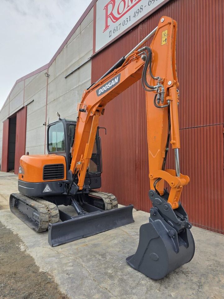 2020 Doosan DX62R-3 mini excavator, front three-quarter view 2020 Doosan DX62R-3 mini excavator, front three-quarter view