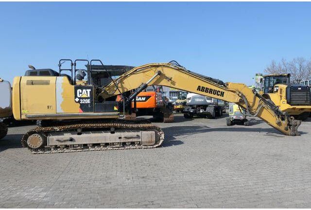 2012 Caterpillar 320E crawler excavator, side view 2012 Caterpillar 320E crawler excavator, side view