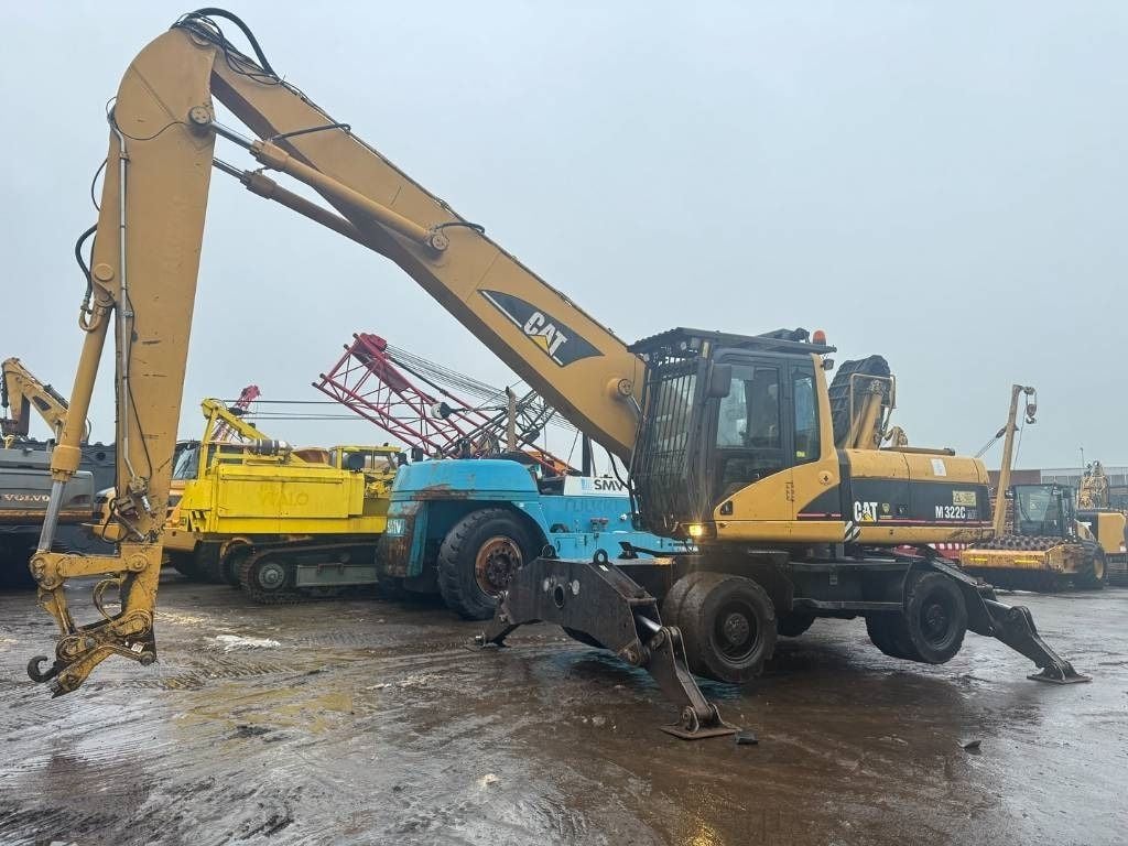 2005 Caterpillar M322C material handler, side view