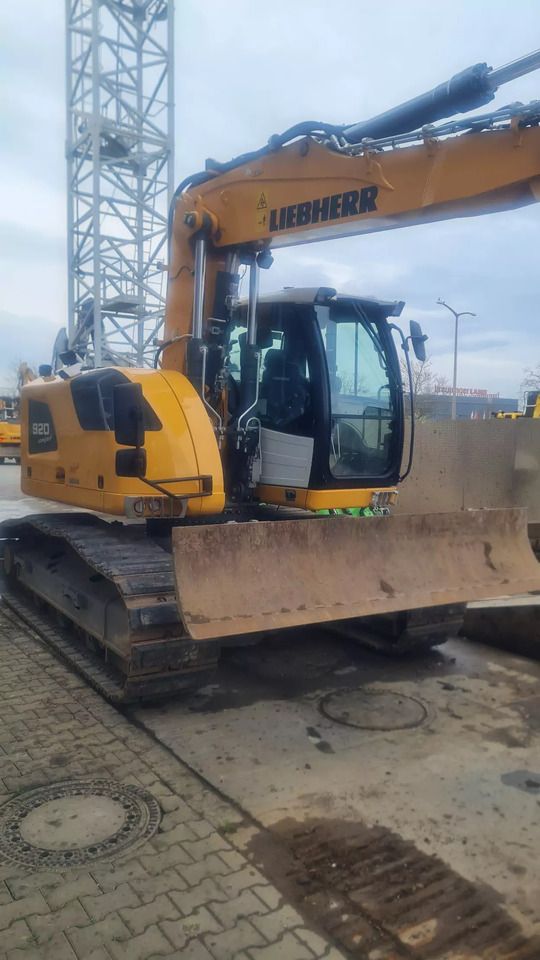 2023 Liebherr R920 Compact crawler excavator, front three-quarter view