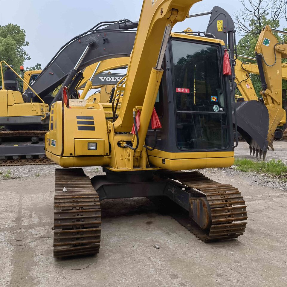 2024 Komatsu PC70-7 excavator, rear three-quarter view 2024 Komatsu PC70-7 excavator, rear three-quarter view