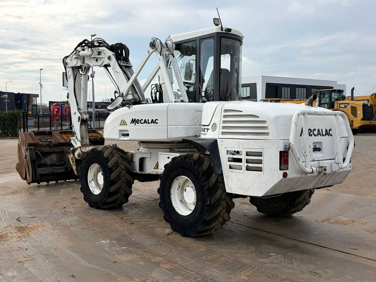 2013 Mecalac 12MTX wheel excavator, rear three-quarter view