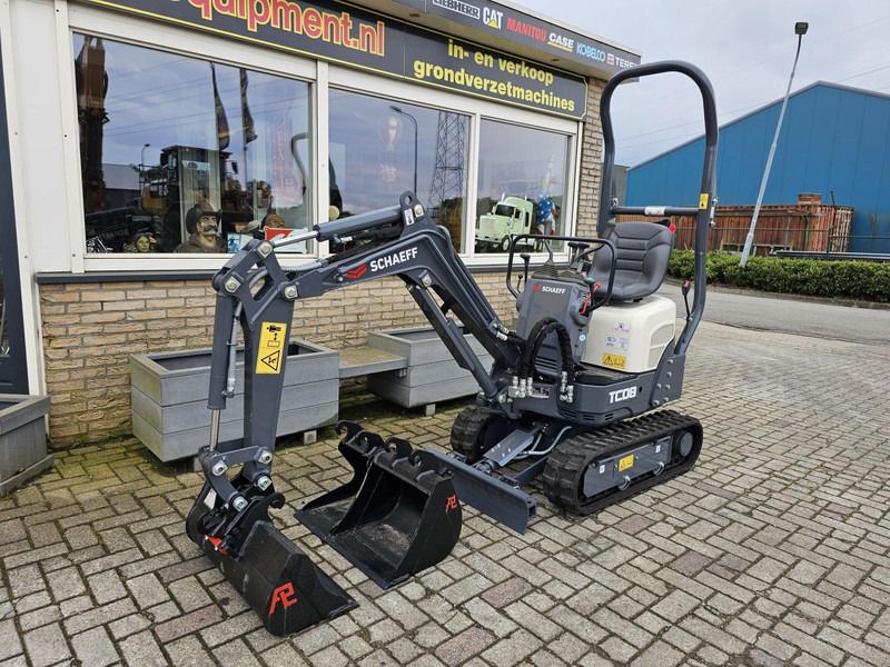 2023 Schaeff TC08 mini excavator, front three-quarter view