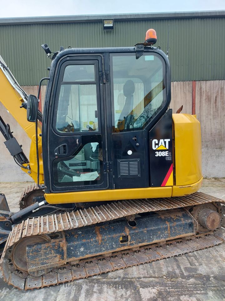 2015 Caterpillar 308E2 CR crawler excavator side view 2015 Caterpillar 308E2 CR crawler excavator side view