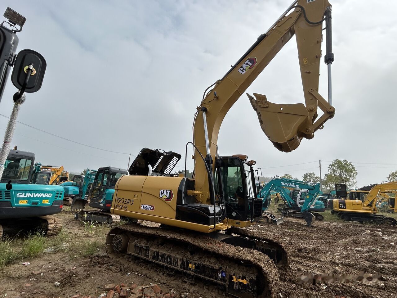 Caterpillar 315D2GC crawler excavator, side view Caterpillar 315D2GC crawler excavator, side view