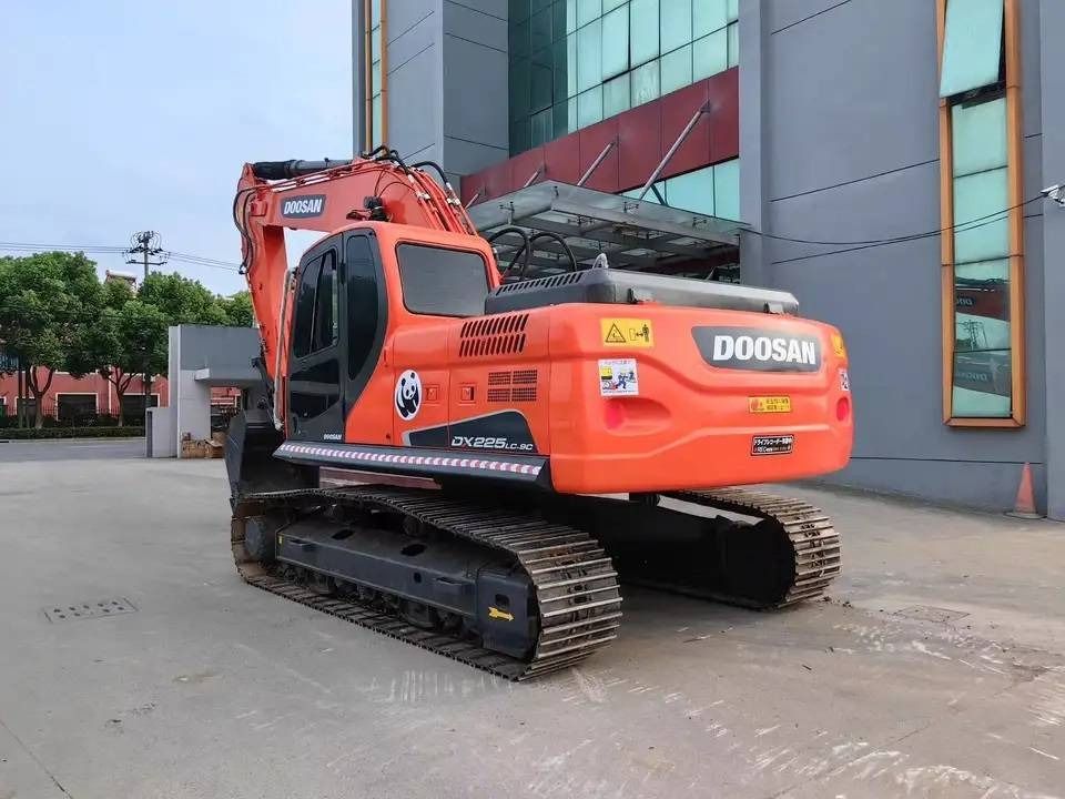2023 Doosan DX225LC-9C crawler excavator, rear three-quarter view