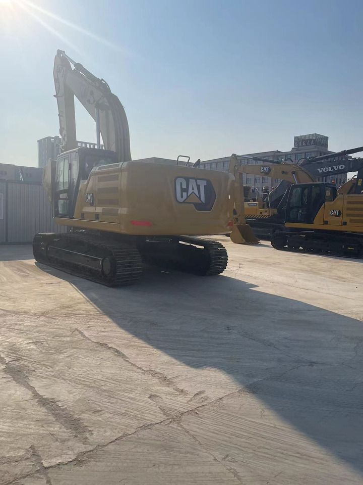 2022 Caterpillar 330GC crawler excavator, rear three-quarter view 2022 Caterpillar 330GC crawler excavator, rear three-quarter view
