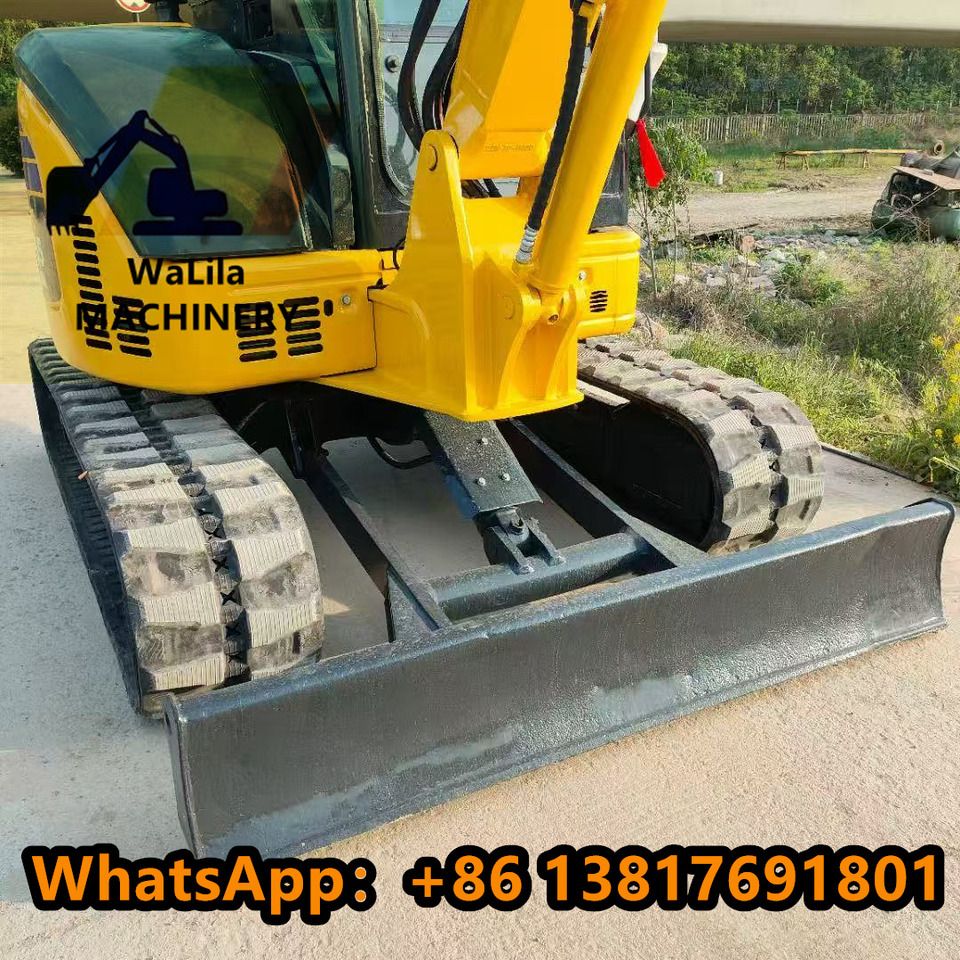 2023 Komatsu PC55 mini excavator front view with blade 2023 Komatsu PC55 mini excavator front view with blade