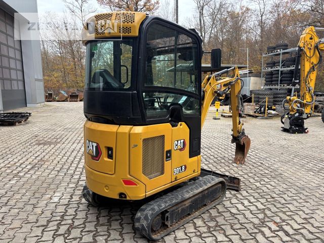 2021 Caterpillar 301.8 mini excavator, rear three-quarter view