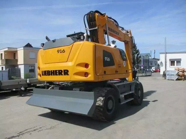 2023 Liebherr A916 wheel excavator, rear three-quarter view