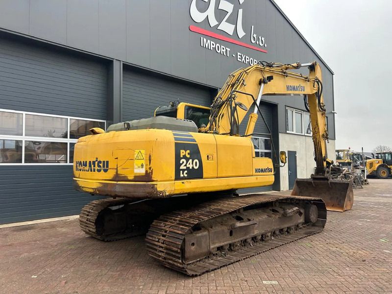 2011 Komatsu PC240LC-8 crawler excavator, rear three-quarter view 2011 Komatsu PC240LC-8 crawler excavator, rear three-quarter view