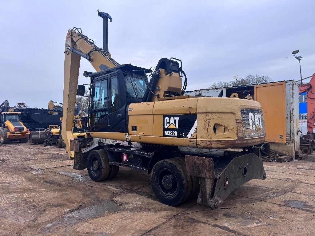 2012 Caterpillar M322D MH material handler, rear three-quarter view